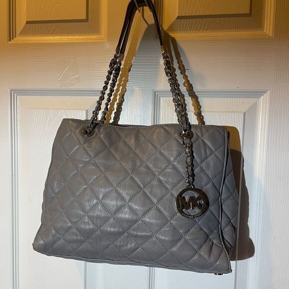 Michael Kors Handbags - Michael Kors soft leather gray quilted shoulder bag silver tone chain straps.